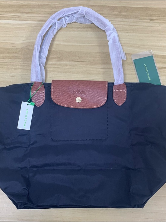 Longchamp Handbags - Longchamp Navy Tote with Brown Leather Trim